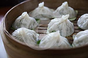 Dim sum dumpling on bamboo basket , Chinese food