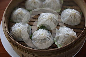 Dim sum dumpling on bamboo basket , Chinese food