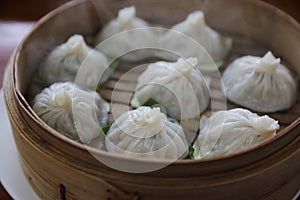 Dim sum dumpling on bamboo basket , Chinese food