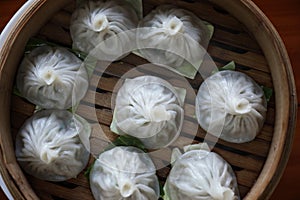 Dim sum dumpling on bamboo basket , Chinese food