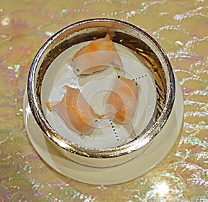 Dim sum goldfish shaped steamed crystal blue har gow or shrimp dumpling