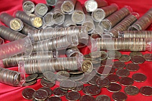 Dimes on red cloth