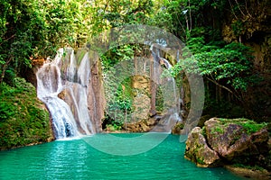 Dimiao Twin waterfalls in a mountain gorge in the tropical jungle of the Philippines, Bohol