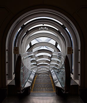 Diminishing perspective in a futuristic escalator tube