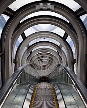 Diminishing perspective in a futuristic escalator tube