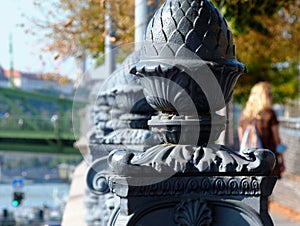 Diminishing perspective view with cast iron railing ornaments and fall street scene in Budapest