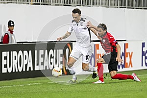 Dimitar Berbatov (L) and Ricardinho (R) during the UEFA Europa L