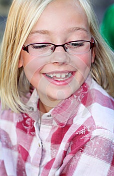 Dimples, Glasses and a Big Smile