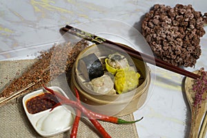 Dimsum is a Cantonese term meaning & x22;snack food& x22;. Usually dimsum is eaten as breakfast or brunch. However photo