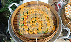 Dimsum mentai with various flavors in a steamer
