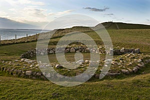 Dinas Dinlle excavated remains of an Iron Age house. Dinas Dinlle is on the North Wales photo
