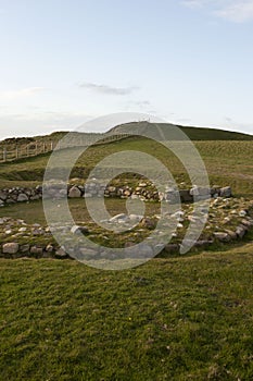 Dinas Dinlle excavated remains of an Iron Age house. Dinas Dinlle is on the North Wales photo