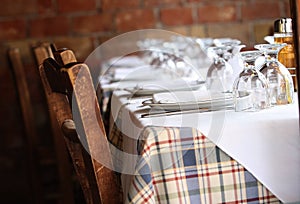 Dine in front of a sunny table, in a good mood.