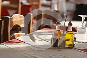 Dine in front of a sunny table, in a good mood.