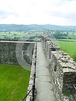Castle walls on the landscape photo