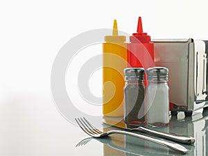 Diner Table with Sweet Condiments photo