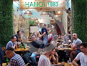 Diners at Bia Hoi Restaurant, Hanoi, Vietnam