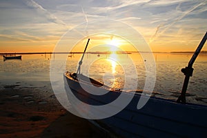 Dinghy on the beach at sunset so lovely