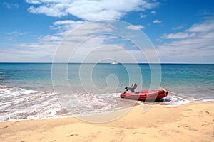 A dingy on the tropical beach