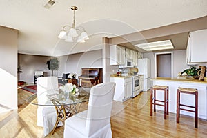 Dining area connected to kitchen and living room