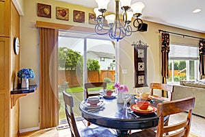 Dining area with exit to backyard patio