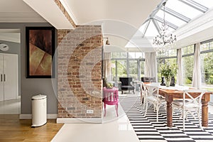 Dining area with glass roof and walls