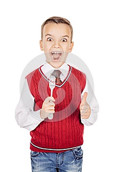 Dining concept. Portrait Hungry Boy holding cutlery fork on hand