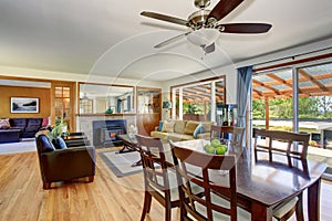 Dining and living room interior with hardwood floor.