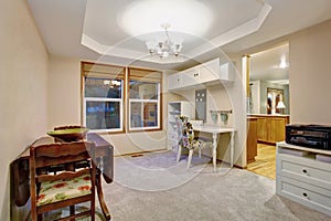 Dining room with antique table set and carpet floor