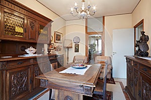 Dining room with antiquities interior photo