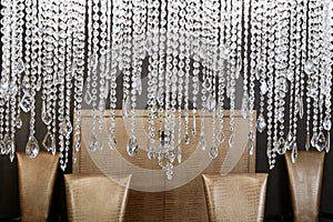 Dining room crystal lamp golden chairs