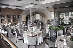 Dining room with elegant table settings.