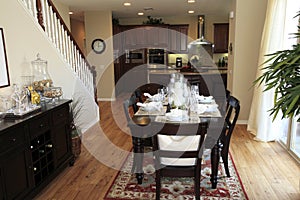 Dining room with a hardwood floor.