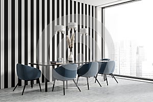 Dining room interior with table and chairs, black and white stripes wall