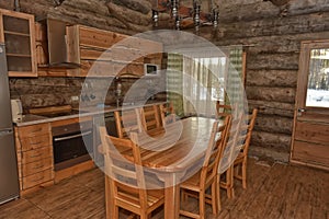 Dining room interior of a wooden house