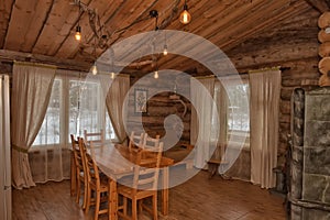 Dining room interior of a wooden house