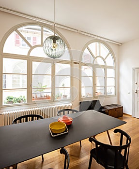 Dining room in renovated design apartment