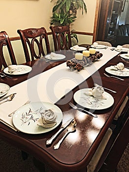 Dining Room Table with Beautiful Antique Place Settings