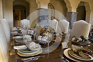 Dining room table set for dinner