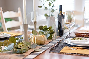 Dining room table set for fall gathering