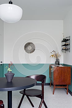 Dining room with vintage wooden cupboard