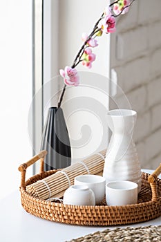 dining table in asian style with tableware