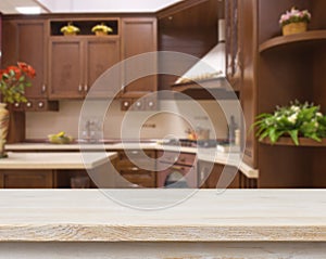 Dining table on blurred brown kitchen interior background