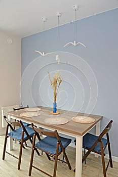 Dining table and chairs in the kitchen. Ecominimalism