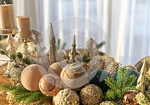 a dining table decorated with toys and Christmas candles