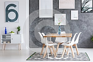 Patterned carpet in dining room