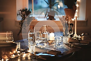 Dining table elegantly decorated for a dinner party