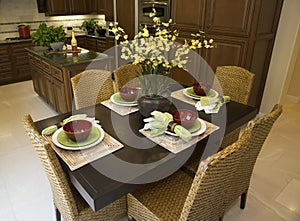 Dining table and kitchen.