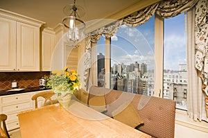 Dining table in kitchen nook penthouse new york