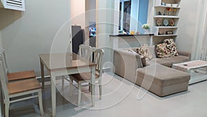 Dining table, living room and the kitchen